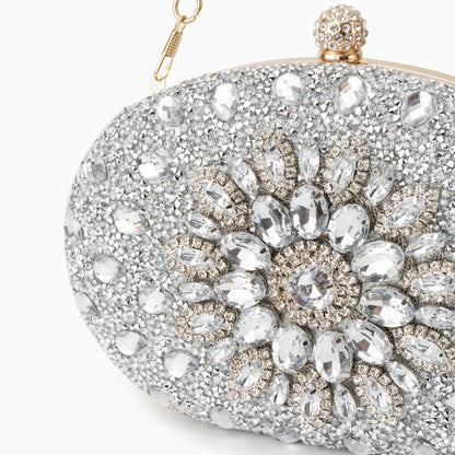 Elegant clutch bag in soft leather with a sleek silhouette and subtle gold tone hardware, showcasing minimalist — view 23