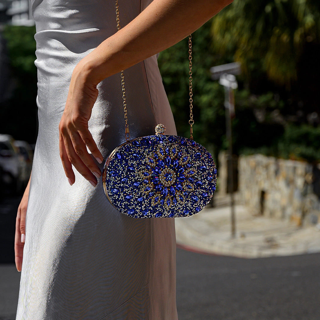 Elegant clutch bag in soft leather featuring a sleek silhouette and gold tone clasp, front view — 4 — view 4