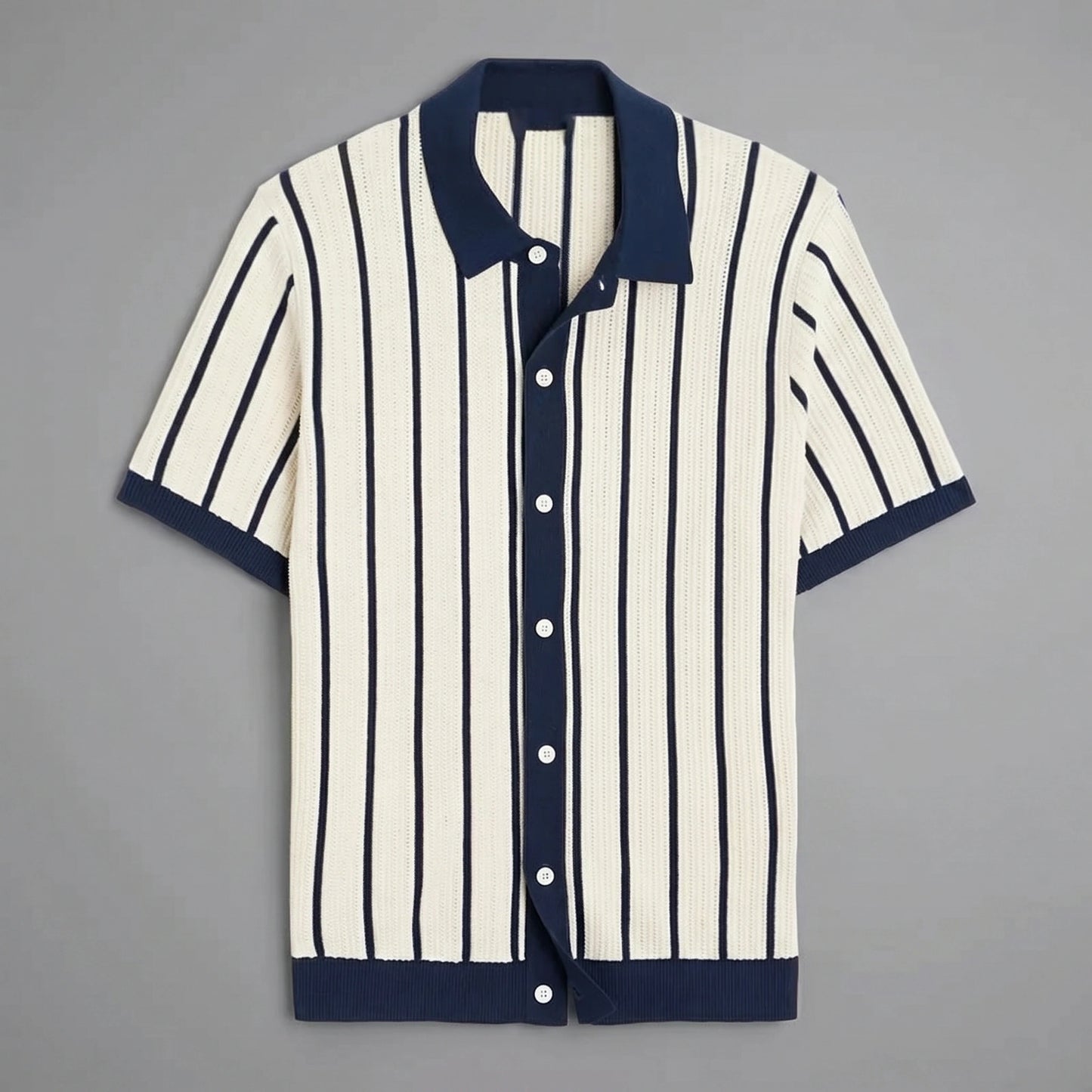 Close up view of the mens slim summer knit shirt showing its soft fabric texture and precise stitching details, set against a neutral background.