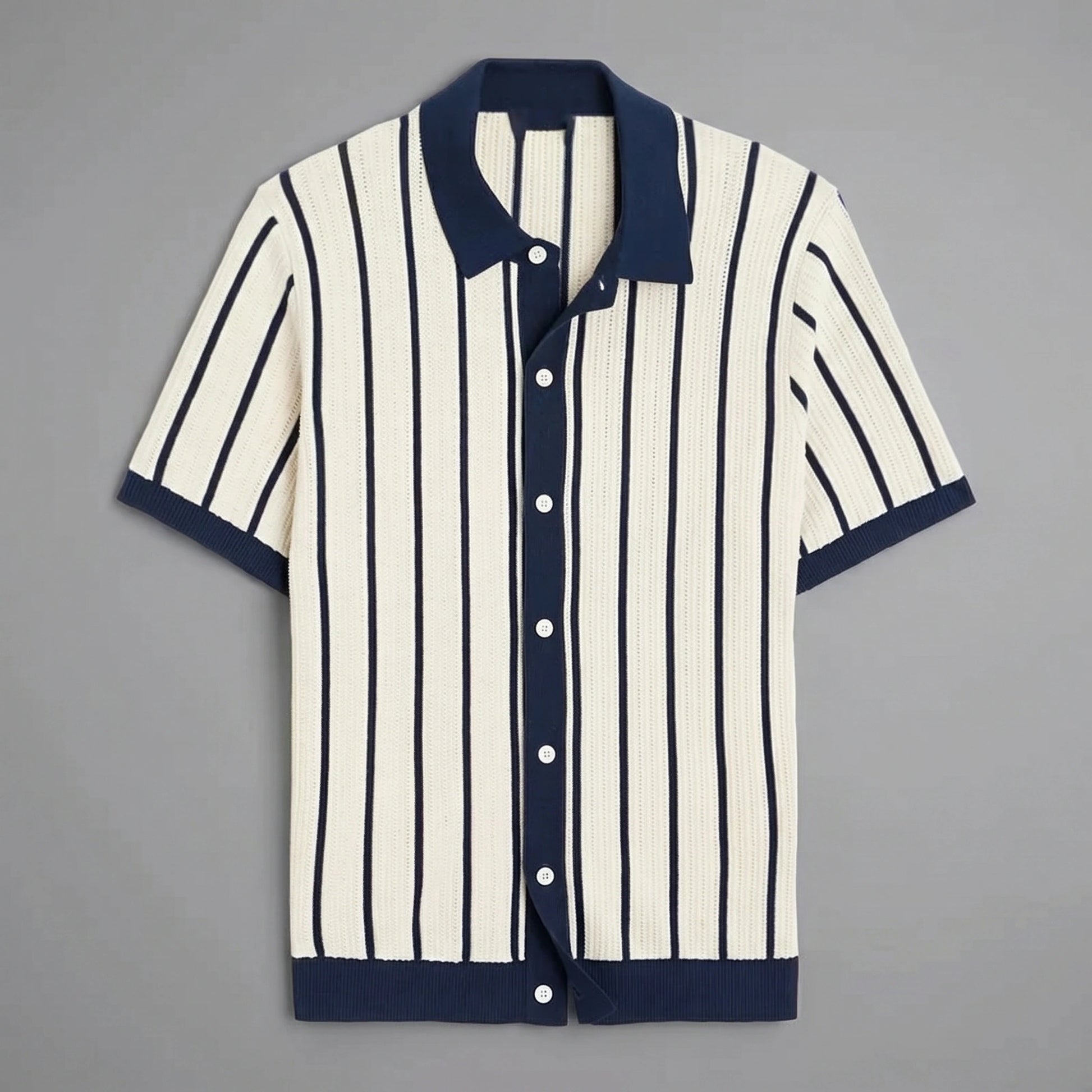 Close up view of the mens slim summer knit shirt showing its soft fabric texture and precise stitching details, set against a neutral background.