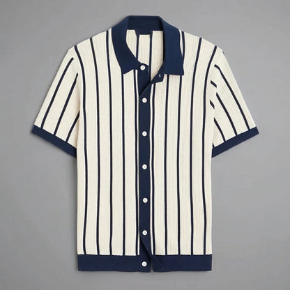 Close up view of the mens slim summer knit shirt showing its soft fabric texture and precise stitching details, set against a neutral background.