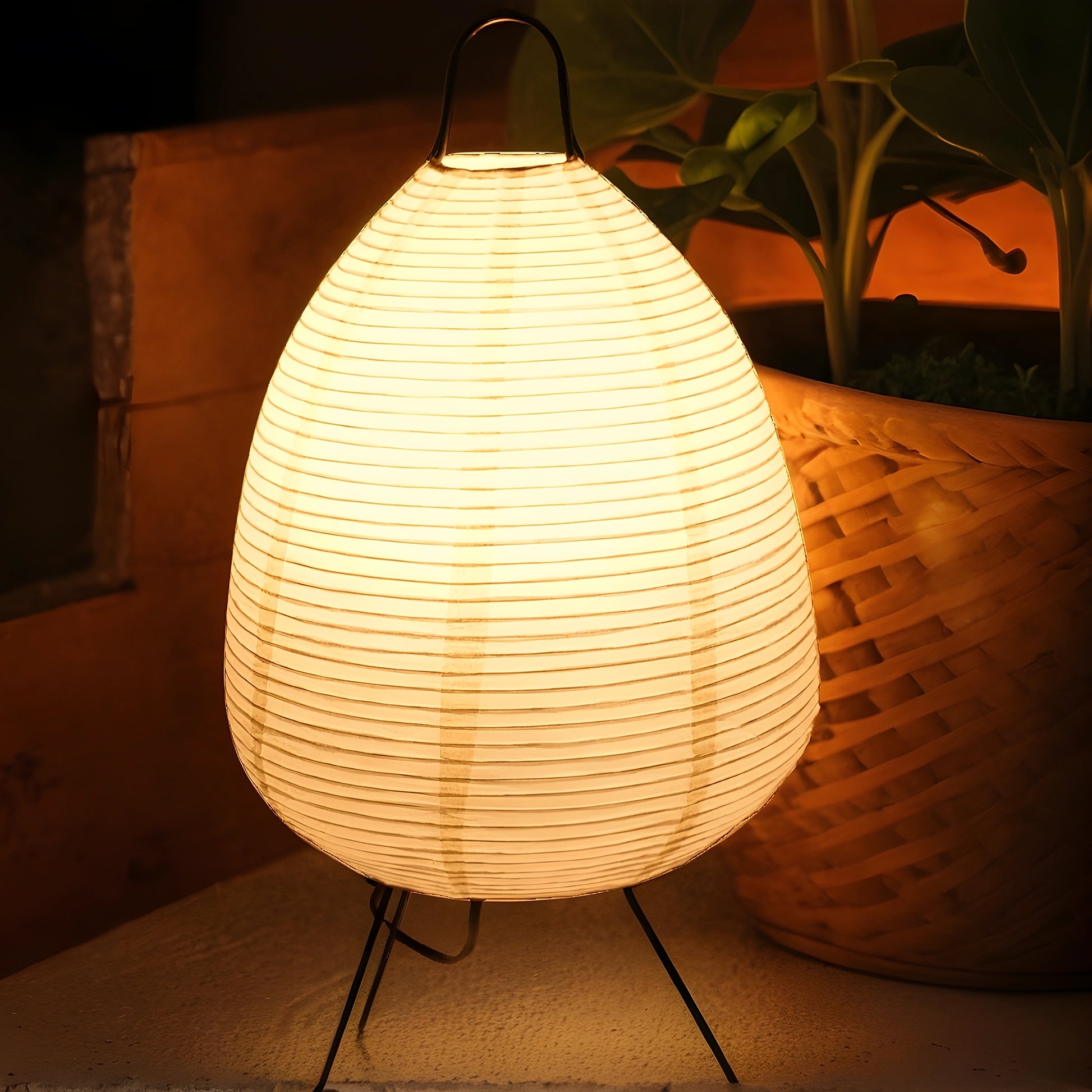 View of a serene minimalist rice paper table lamp featuring a soft white shade and a natural wood base, perfect for living rooms