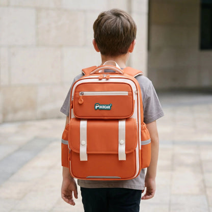 View of a structured ergonomic nylon school backpack in dark blue, featuring padded straps and multiple compartments for organization