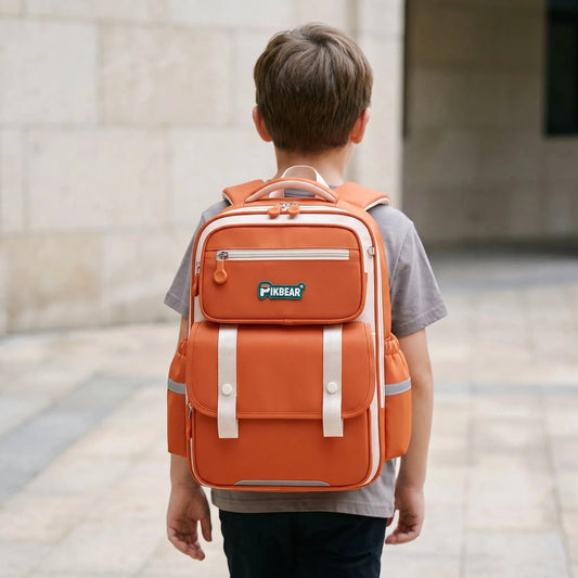 View of a structured ergonomic nylon school backpack in dark blue, featuring padded straps and multiple compartments for organization