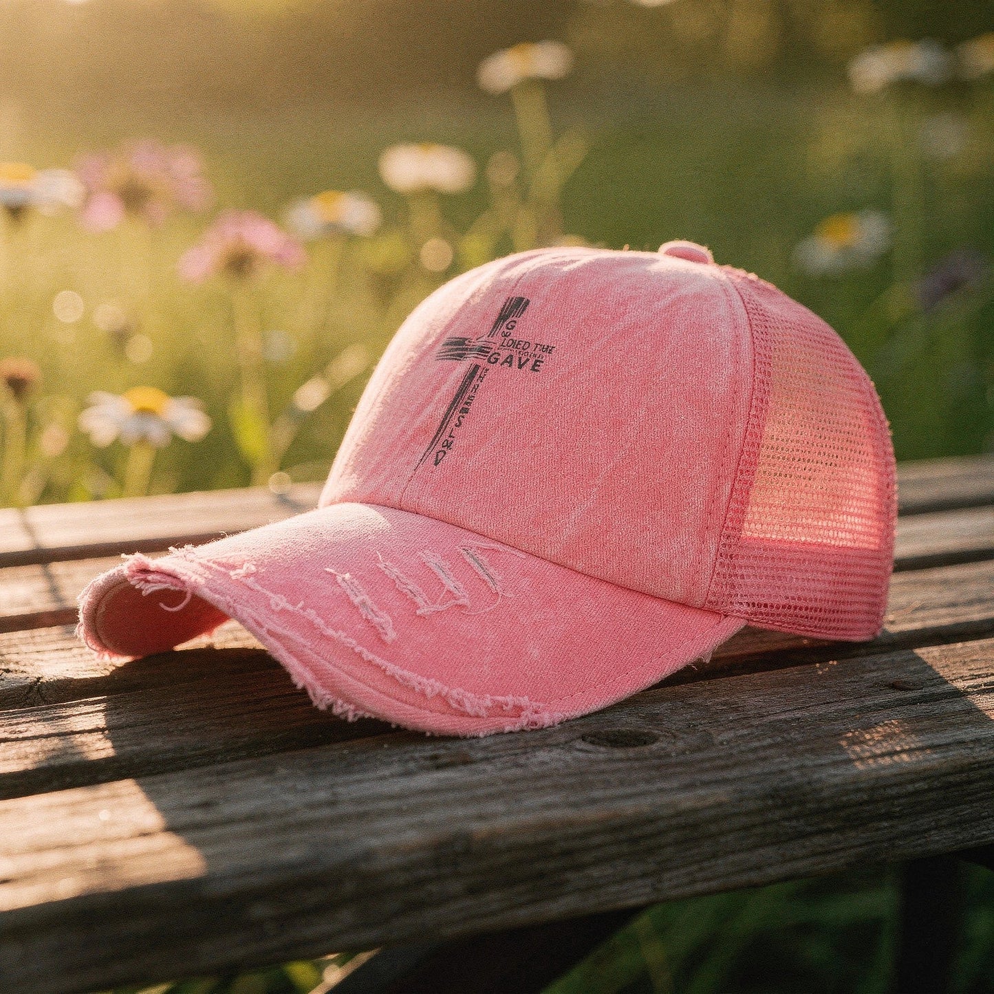 Light pink summer baseball cap made of breathable fabric, featuring a curved brim and adjustable strap, detailed view