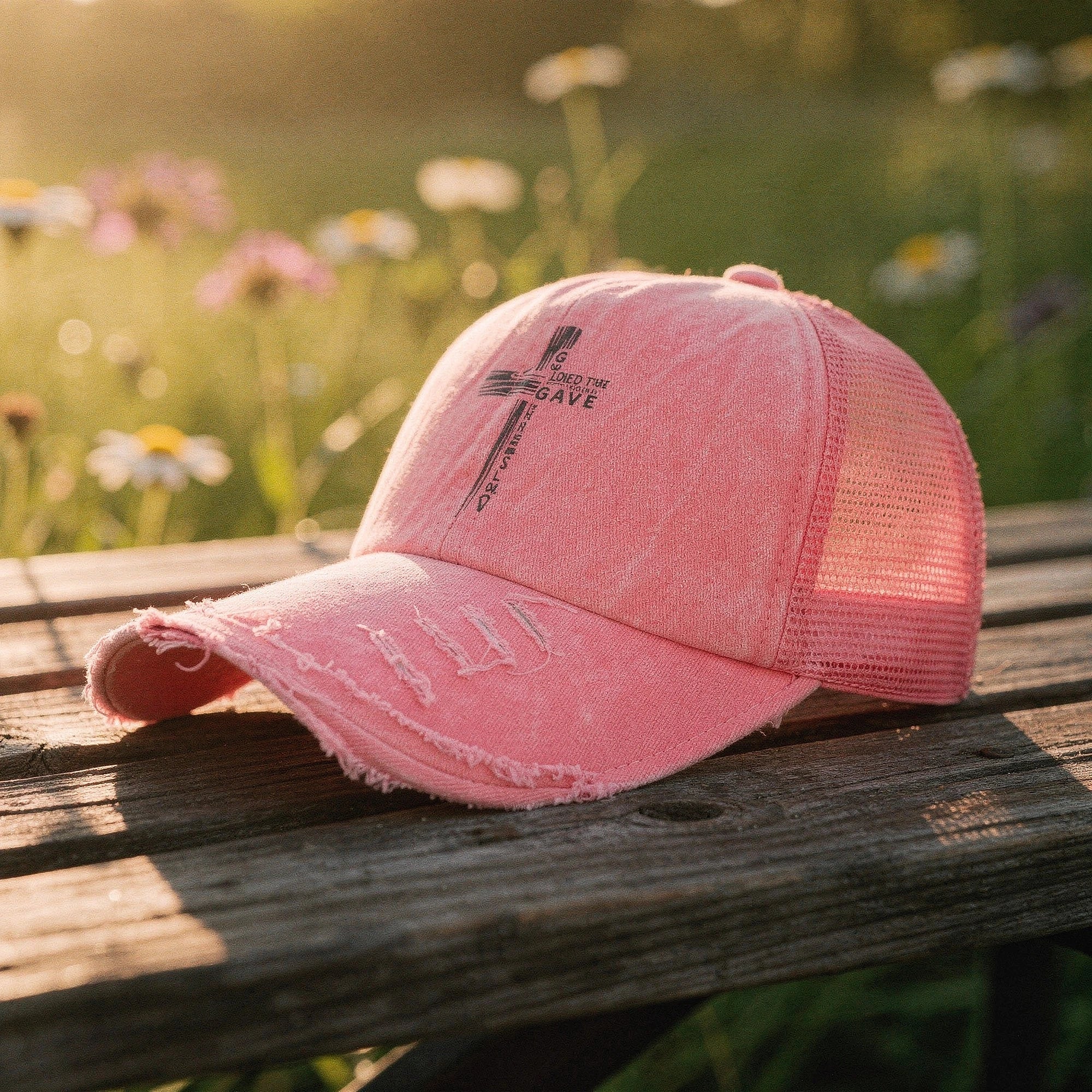 Light pink summer baseball cap made of breathable fabric, featuring a curved brim and adjustable strap, detailed view