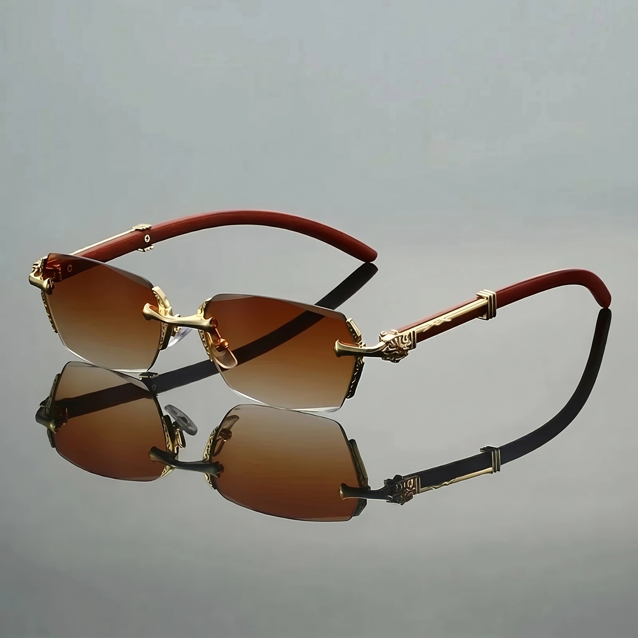 Close up view of the gradient semi rimless sunglasses showing the sleek frame design and intricate detailing against a soft, neutral background.