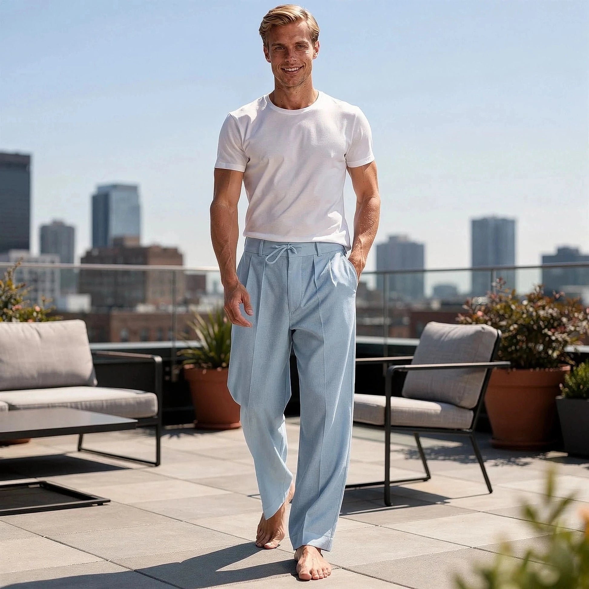 Light gray relaxed fit drawstring pants with pockets and elastic waistband, view showcasing fabric texture