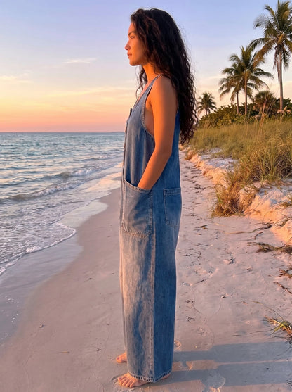Close up view of the women's effortless vintage inspired denim overalls showing the soft fabric texture, detailed stitching, and relaxed fit, perfect for casual styling.