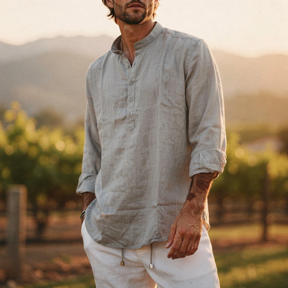 Lightweight summer henley shirt in soft cotton, featuring a relaxed fit, short sleeves, and a buttoned placket in a light gray color