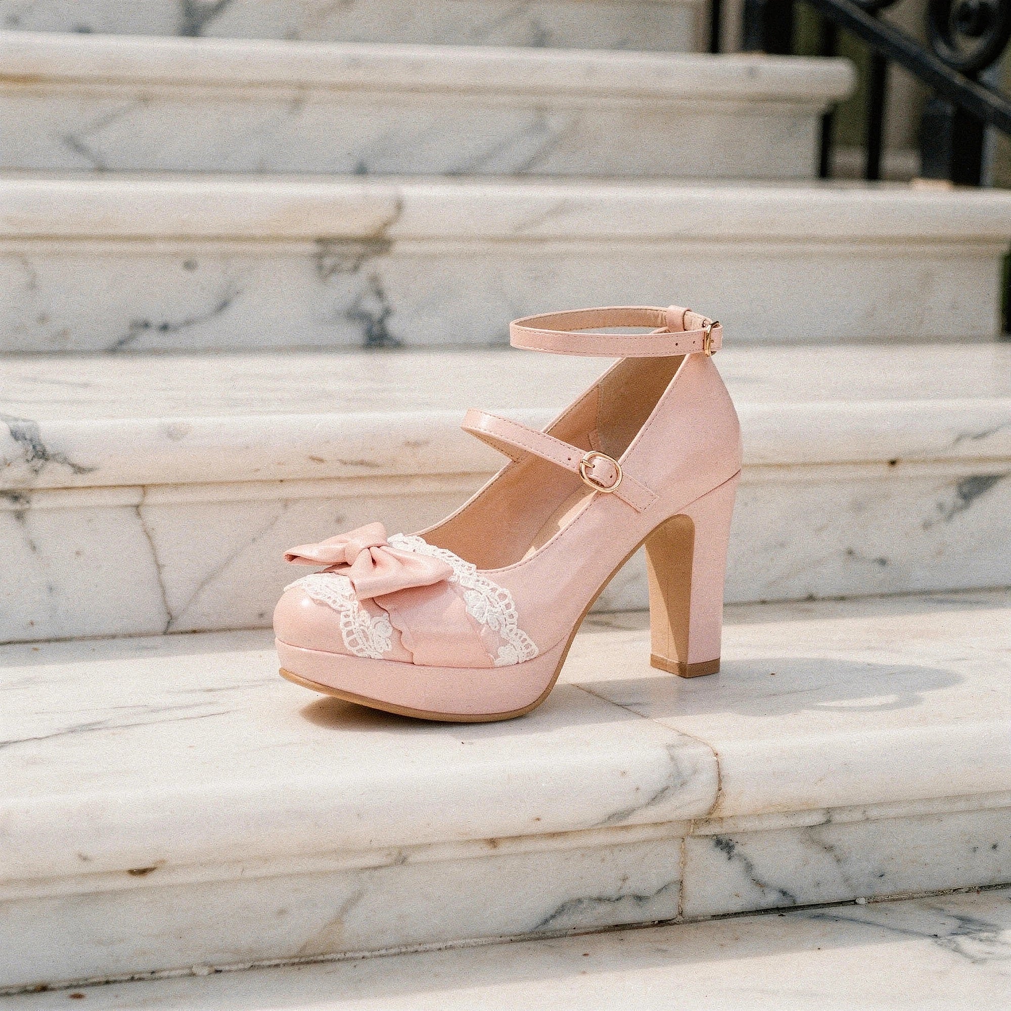View of elegant high heeled shoes in soft velvet with charming lace frill accents, showcasing a delicate design