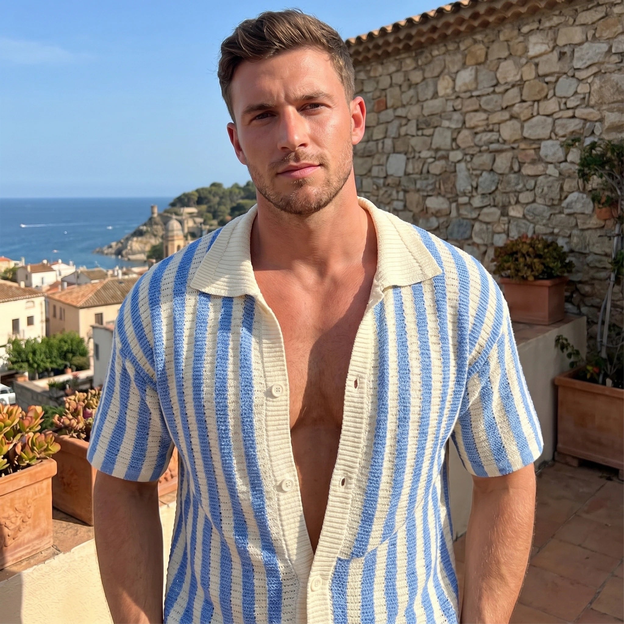 Close up of the mens striped relaxed summer cardigan showing its lightweight fabric, intricate stitching, and China Mainland palette against a neutral background.