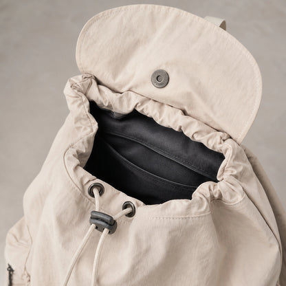 Beige Spacious Drawstring Backpack Magnetic Flap and Detail — view 7