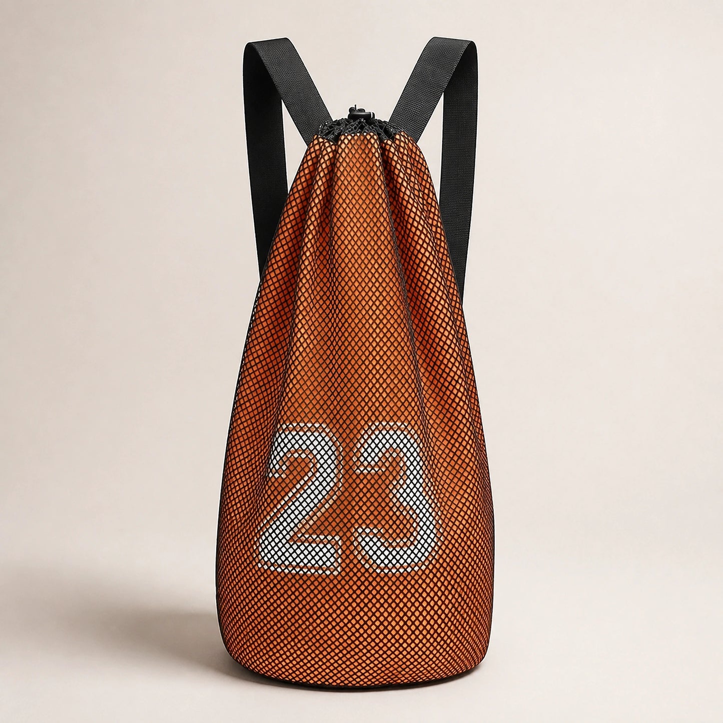 drawstring backpack — Orange and black mesh athletic drawstring ball backpack, complete front product view — view 3
