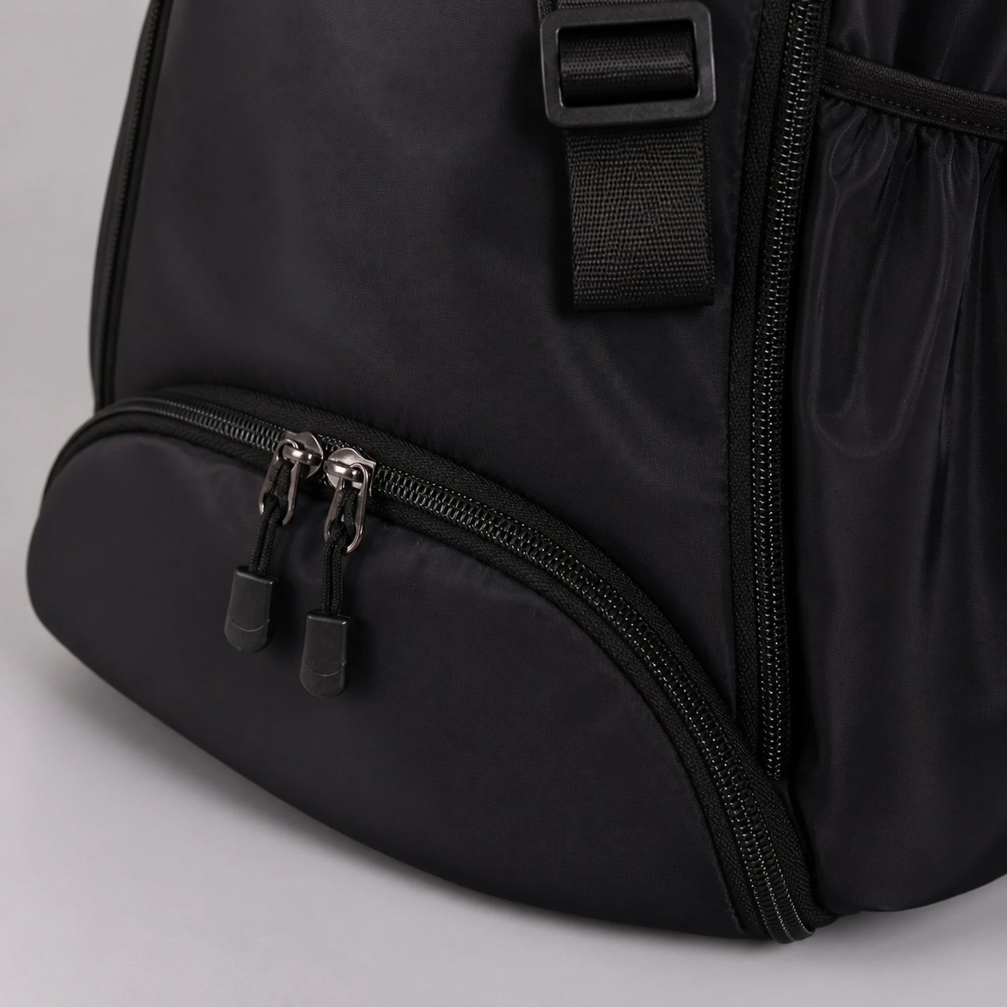 drawstring backpack — Black drawstring sports backpack, zipper strap and material detail — view 7