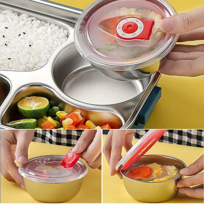 View of a modern stainless steel lunch box with a sleek design, featuring a durable exterior and secure lid