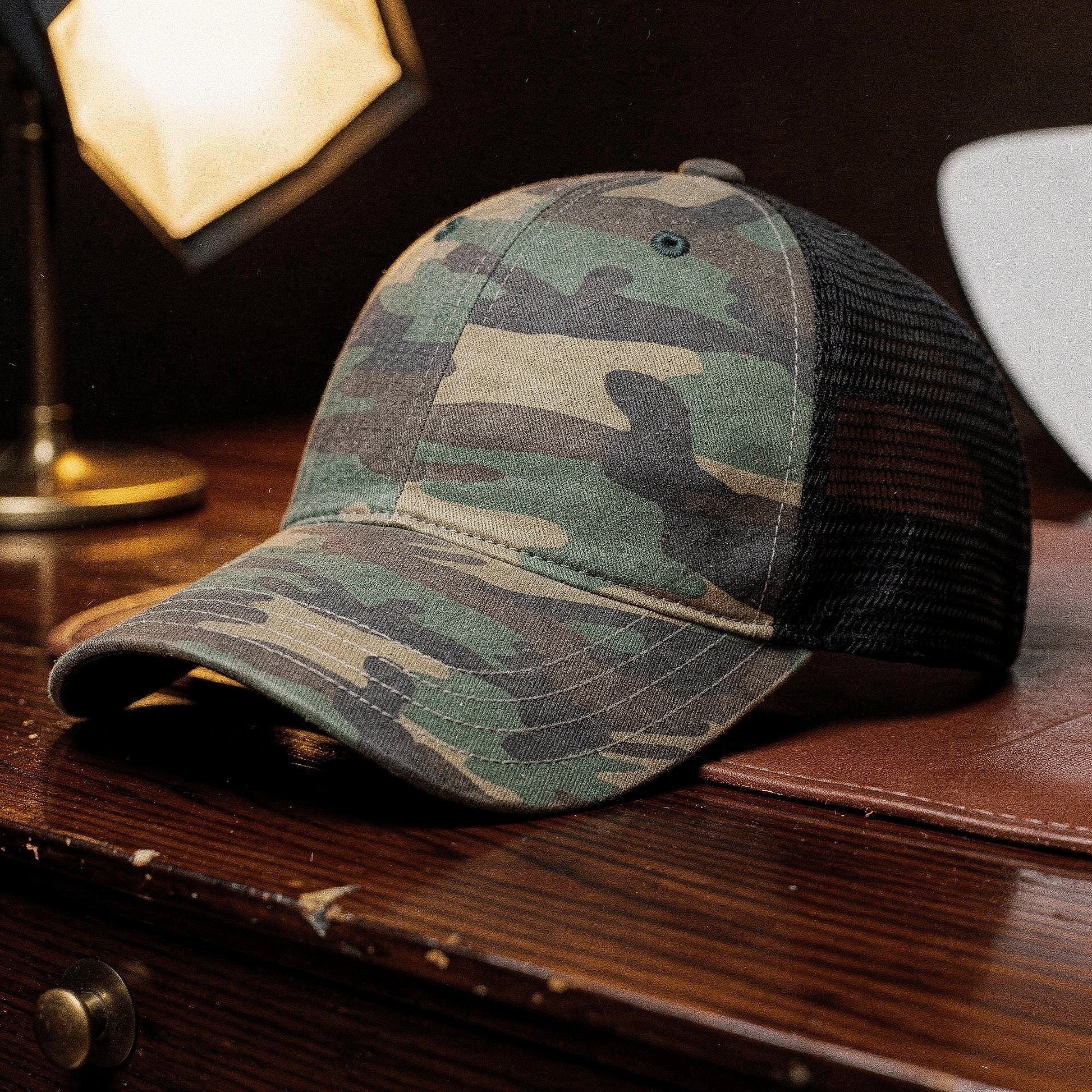 View of a relaxed vintage snapback cap in dark green, featuring a curved brim and adjustable strap