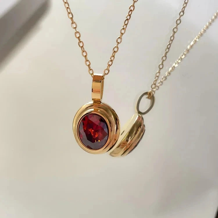 View of a vintage necklace featuring a delicate chain and a stunning peridot gemstone pendant