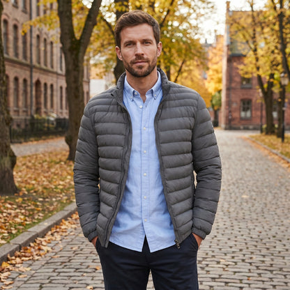 Close up view of the Mens Lightweight Slim Transitional Puffer Jacket showing the sleek fabric texture, precise stitching details, and modern design elements.