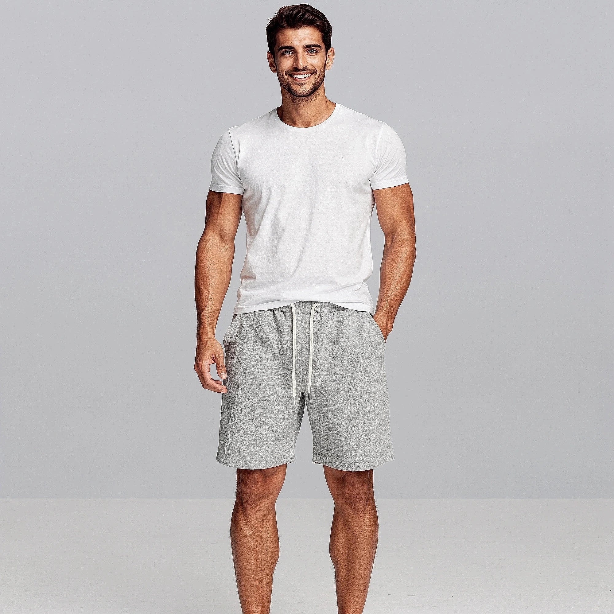Light gray relaxed loose waffle shorts featuring an elastic waistband and pockets, view