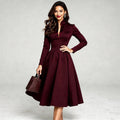 Elegant V neck midi dress in soft fabric, featuring a flattering silhouette and a view showcasing its graceful design