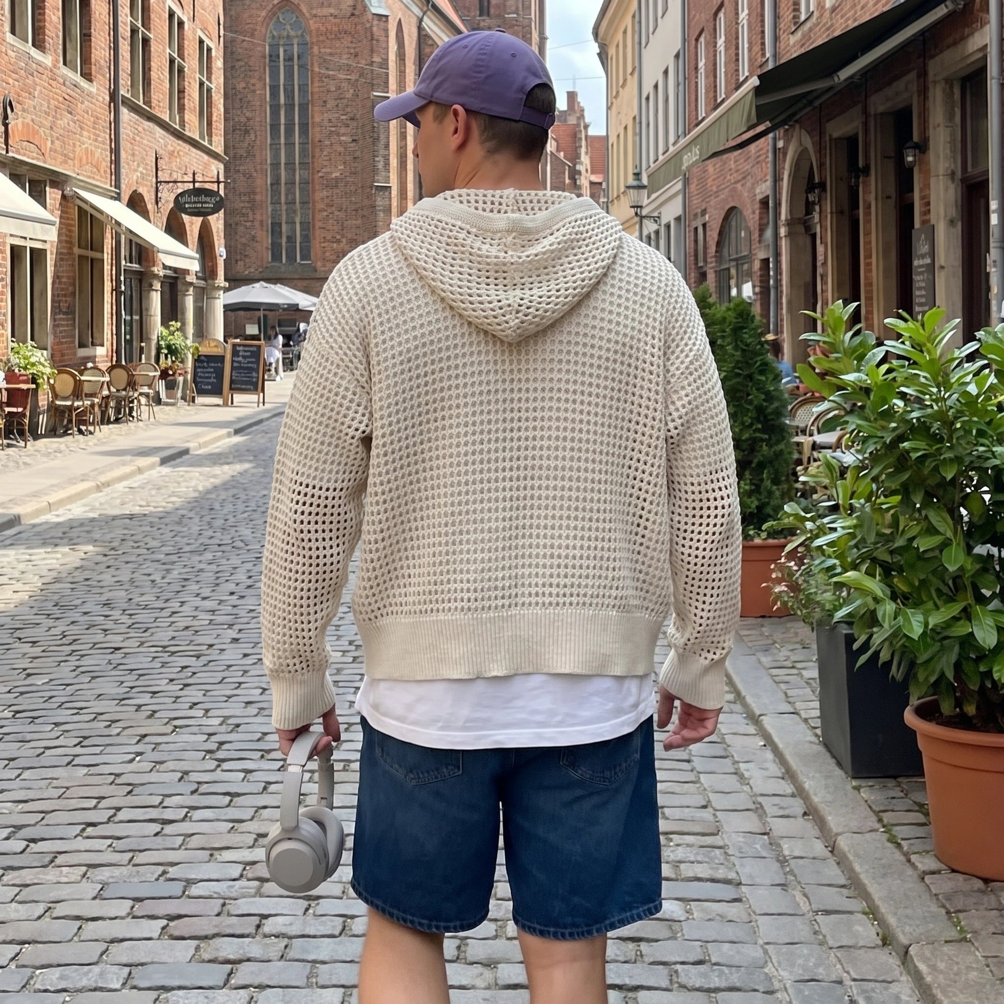Close up view of the men's casual lightweight summer hoodie showing the soft fabric texture, precise stitching, and design details against a neutral background.