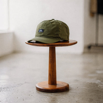 View of a stylish men's baseball cap in dark gray, featuring breathable fabric and a curved brim