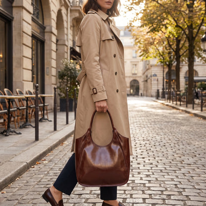 Close up view of the Glossy Cowhide Tote Bag showing its luxurious texture, precise stitching, and high quality — view 4