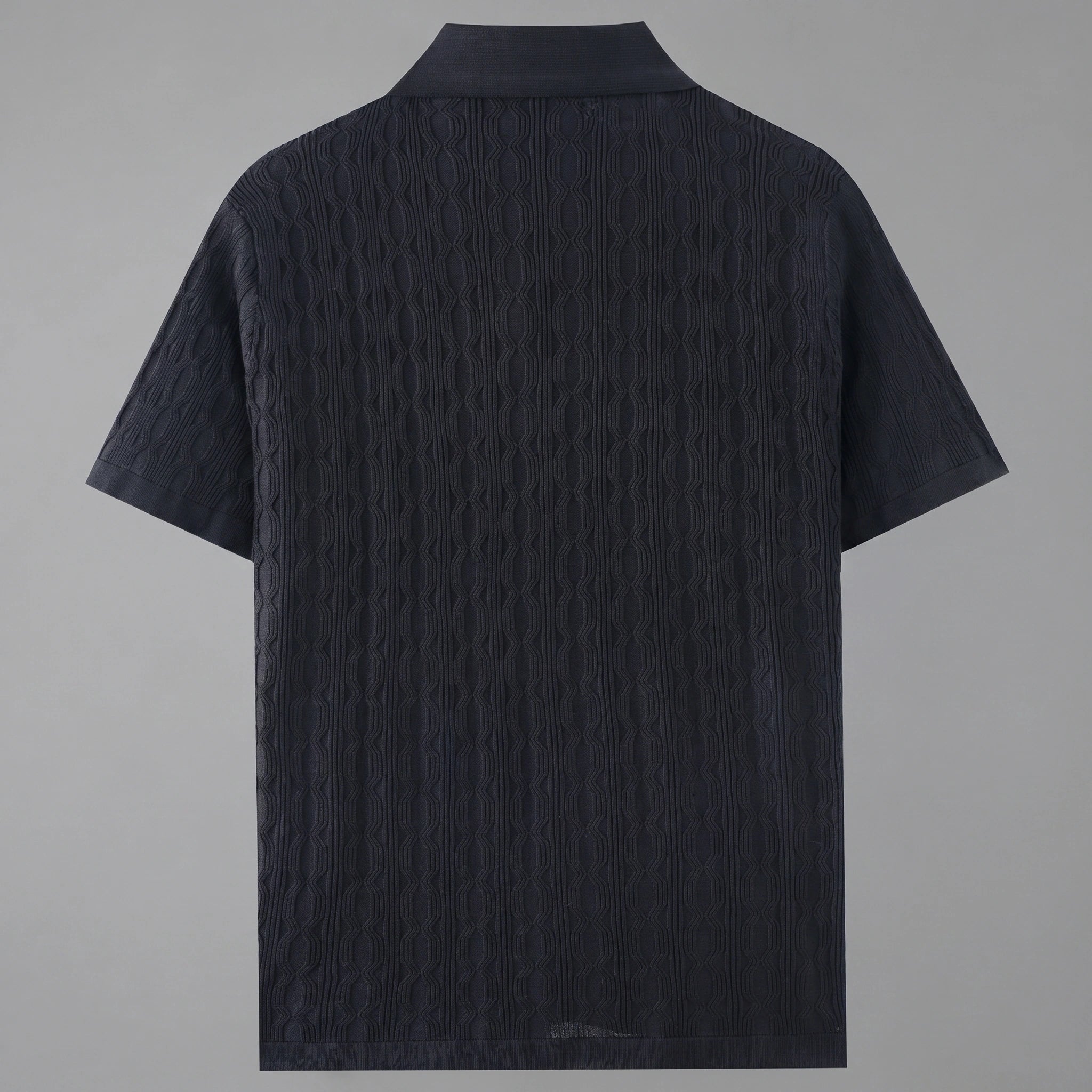 Close up view of the mens textured lightweight casual shirt showing the intricate fabric weave and precise stitching details against a neutral background.
