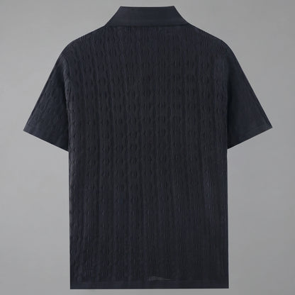 Close up view of the mens textured lightweight casual shirt showing the intricate fabric weave and precise stitching details against a neutral background.