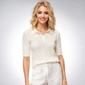 View of a relaxed fit women's t shirt in soft, lightweight knitted fabric, featuring a classic crew neckline and short sleeves