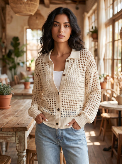 A model showcases the Womens Hollow Knit Autumn Cardigan in a warm beige color, styled with high waisted jeans against a neutral backdrop.
