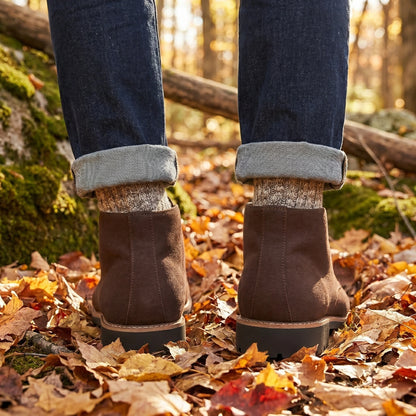Close up view of the Men's Casual Lace Up Ankle Boots showing the premium leather texture, detailed stitching, and design elements against a neutral background.