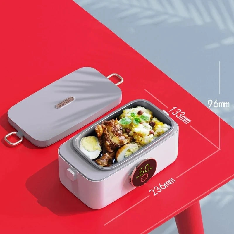 View of a sleek portable electric lunchbox in a modern design, featuring a stainless steel interior and easy to use lid