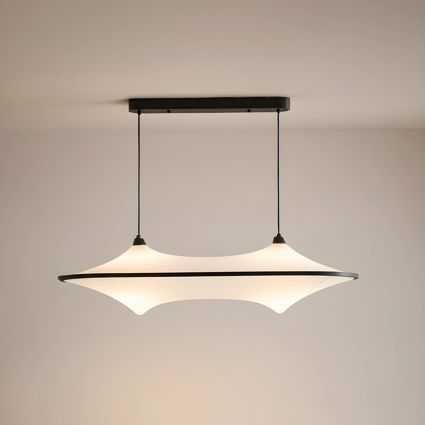 A sleek modern iron pendant light fixture is showcased in a full front view, showing its minimalist design against a white background.