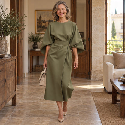 fall dress — Ava Olive Green complete front view, worn by a joyful smiling adult model age 50 in real setting — view 2