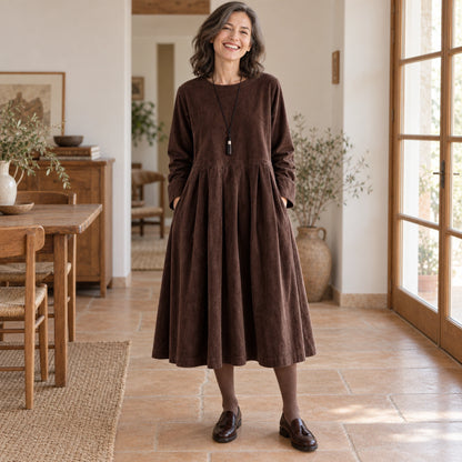 fall dress — Harper Brown complete front view, worn by a joyful smiling adult model age 52 in real setting — view 2