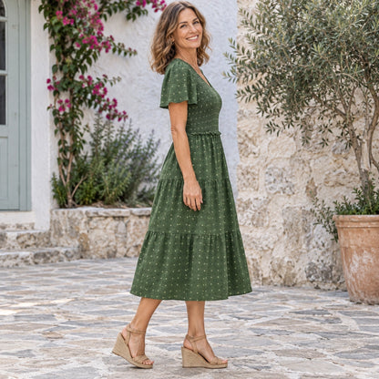 fall dress — Luna Smocked Flutter Sleeve Tiered Midi Dress Army Green side worn by an adult model in a realistic — view 5
