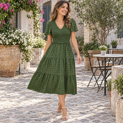 fall dress — Luna Smocked Flutter Sleeve Tiered Midi Dress Army Green worn by an adult model in a realistic setting — view 9