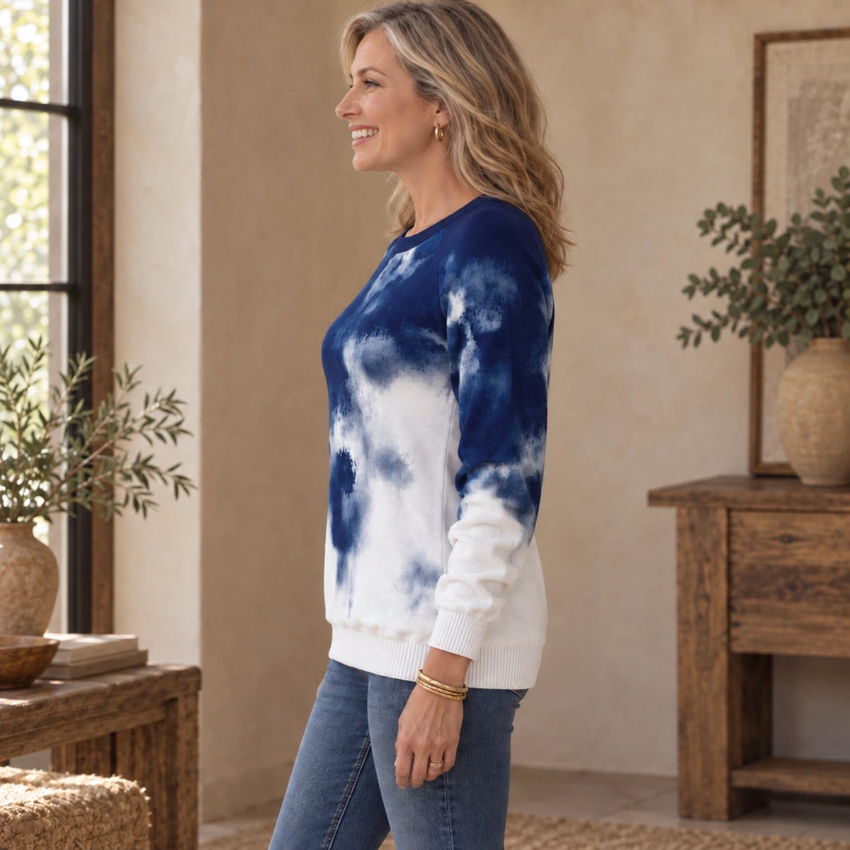 fall sweater — Charlotte Blue side worn by an adult model in a realistic setting, complete garment visible — view 3