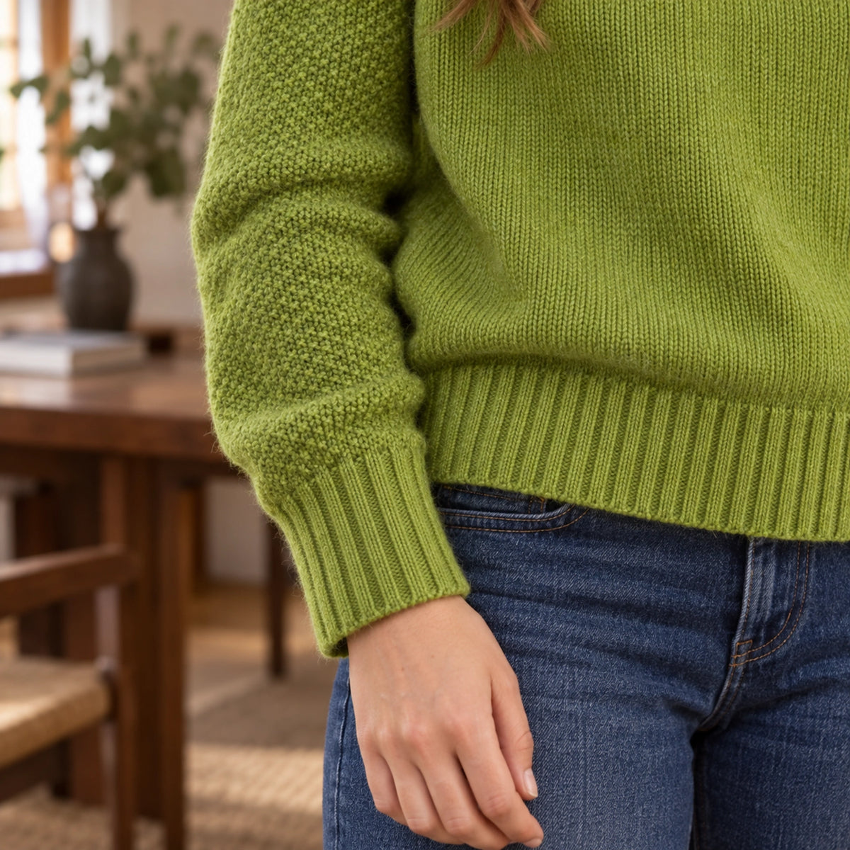 fall sweater — Chloe green raglan turtleneck sweater — cuff detail view worn by an adult model — view 4
