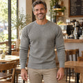 fall sweater — Elijah Textured Raglan Crewneck Sweater Gray front worn by a smiling adult model in realistic setting