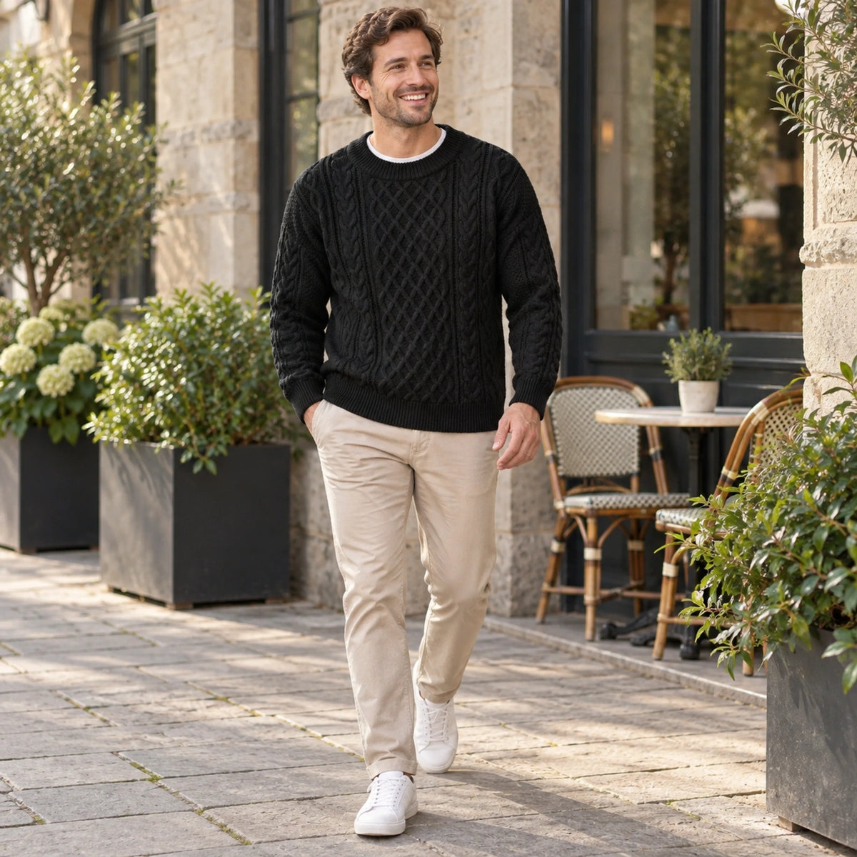 fall sweater — Ethan Cable Knit Crewneck Sweater Black worn by an adult model in a realistic setting, complete — view 9