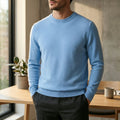 Fall sweater — Light blue cashmere crewneck worn indoors, showcasing a style