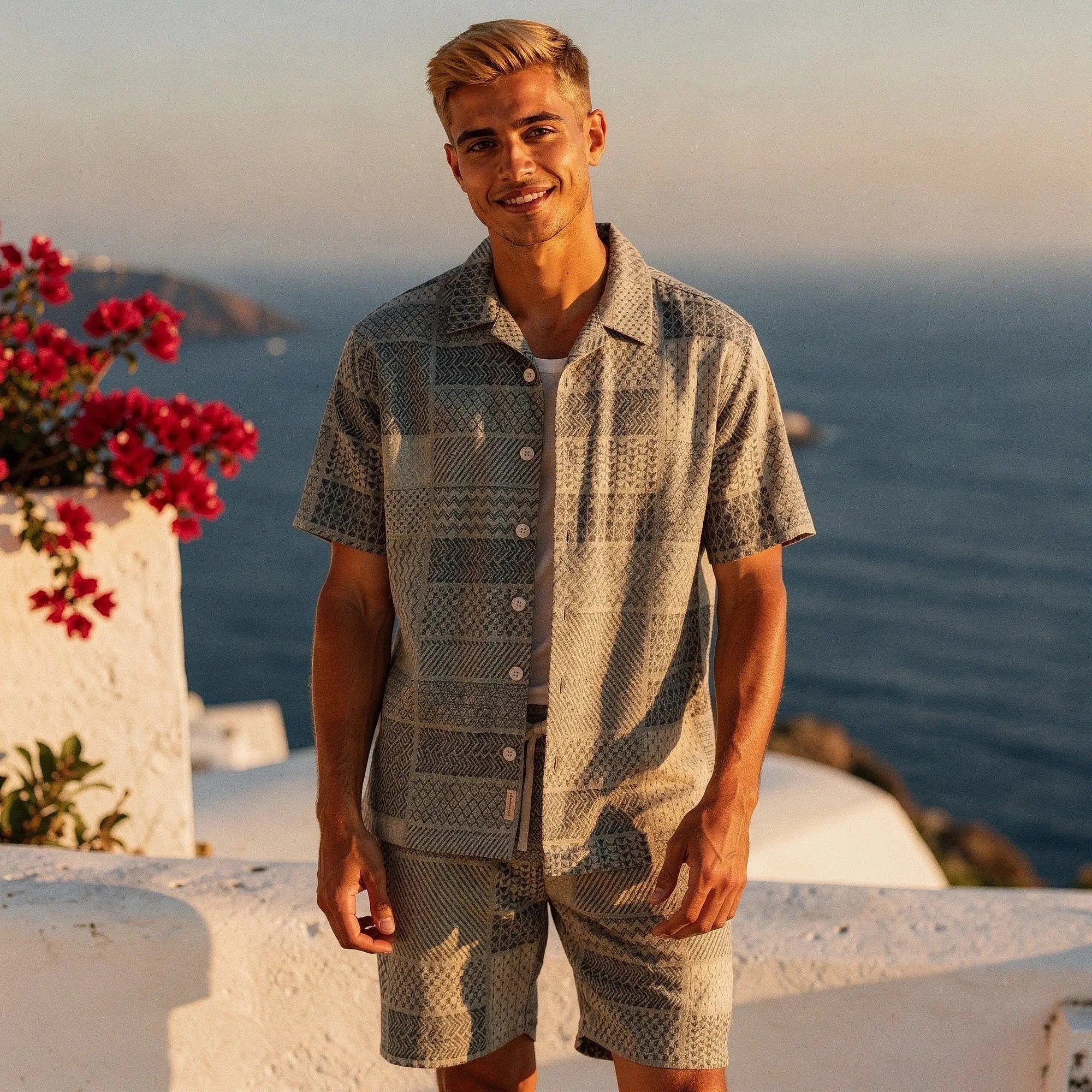 View of a relaxed fit short sleeve button up resort shirt in light blue, featuring a comfortable fabric and casual style