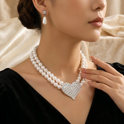 A model showcases the Womens Timeless Jewelry Set, showing sophisticated pieces against a neutral background, enhancing her , high waisted outfit.