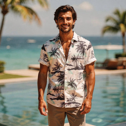 Lightweight short sleeve Hawaiian shirt featuring a vibrant floral pattern in shades of blue and green, view