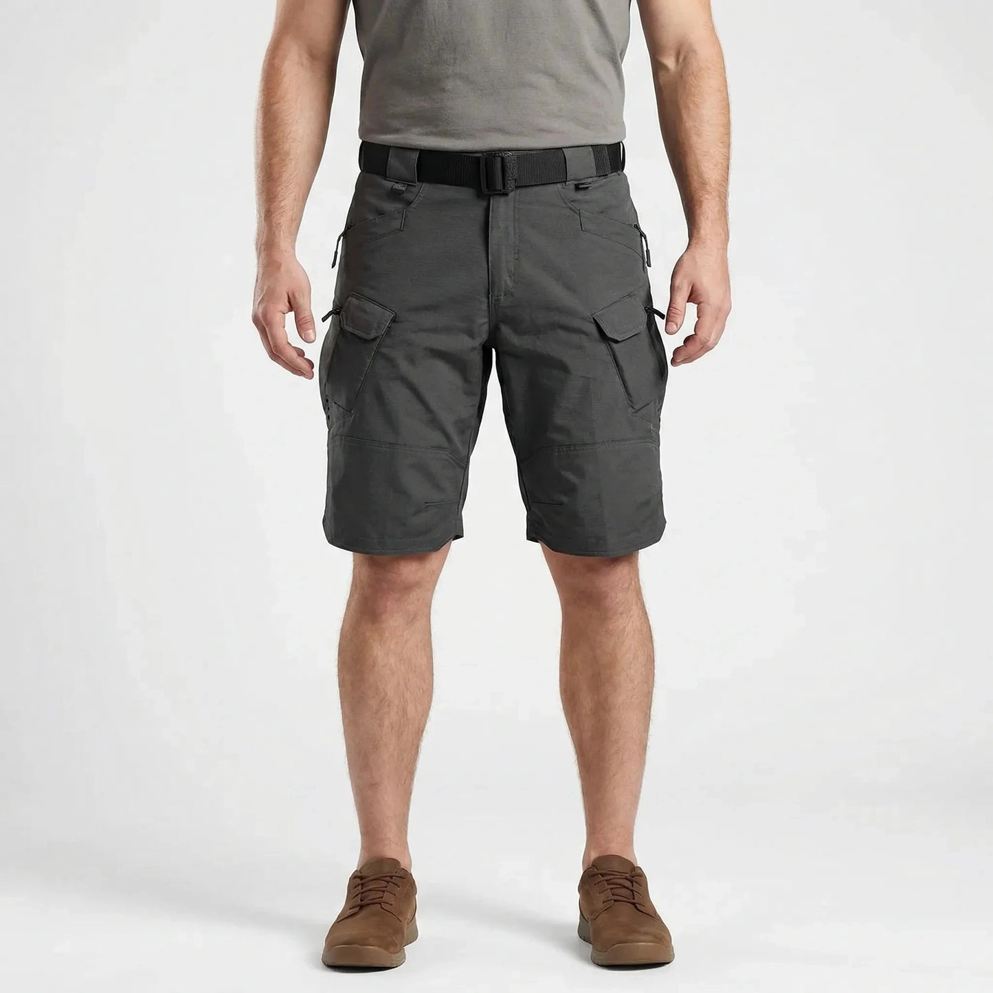 View of durable practical cargo shorts in khaki, featuring multiple pockets and a classic fit, showcasing the fabric texture