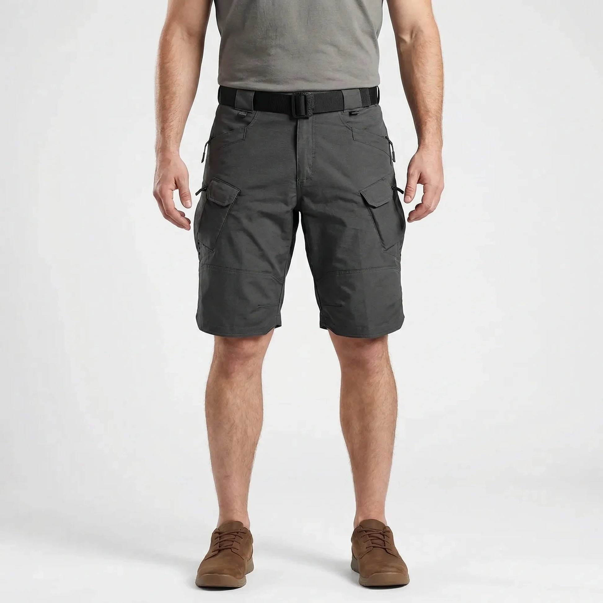 View of durable practical cargo shorts in khaki, featuring multiple pockets and a classic fit, showcasing the fabric texture