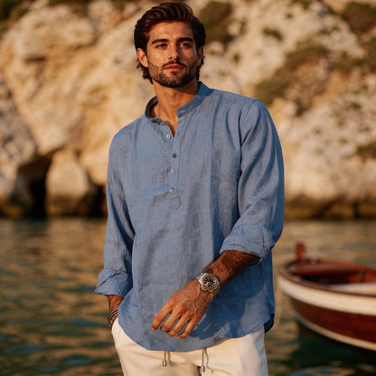Lightweight summer henley shirt in light blue, featuring a three button placket and short sleeves, view